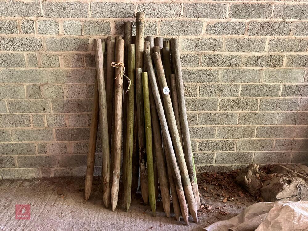 22 USED WOODEN STAKES