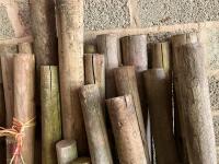22 USED WOODEN STAKES - 8