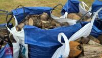 DUMPY BAGS OF LOGS
