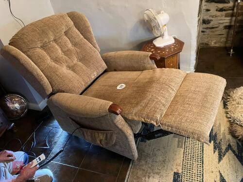 BROWN RECLINING ARM CHAIR