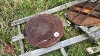 2 CAST IRON CIRCULAR MANHOLE LIDS - 2