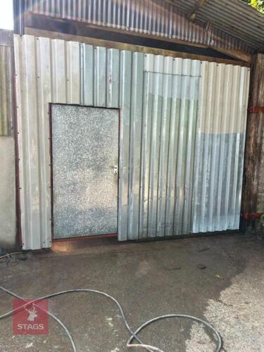 SHEETED DOOR WITH A PERSONNEL DOOR