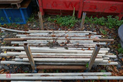 STILLAGE C/W APPROX 35 SCAFFOLDING PIPES