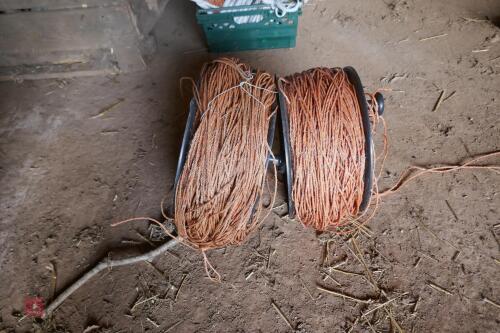 2 LARGE REELS OF USED ELEC FENCING WIRE