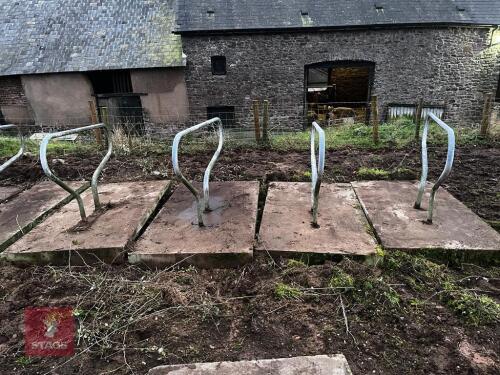 4 CUBICLE DIVIDERS ON CONCRETE PADS