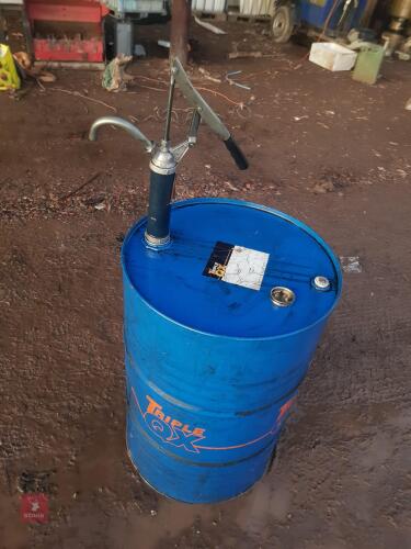 OIL DRUM AND PUMP CONTAINING OIL