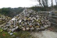 HEAP OF FIREWOOD LOGS