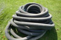 ROLL OF BLACK PLASTIC 4'' DRAINAGE PIPE - 2