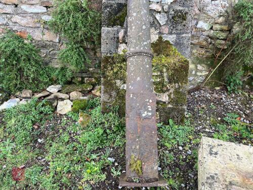 PAIR OF LONDON DEWER CAST BOLLARDS