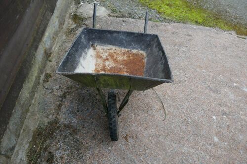 SMALL METAL WHEELBARROW