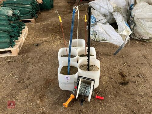 5 STONE WEIGHTS & FENCE REEL (65)