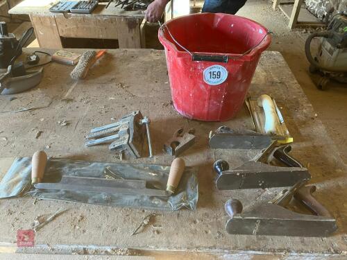 BUCKET CONTAINING VARIOUS HAND PLANES