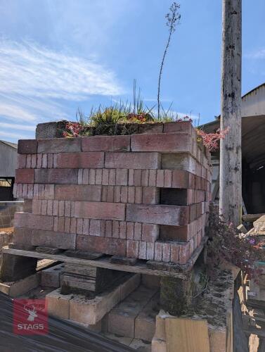 HALF A PALLET OF RED BRICKS