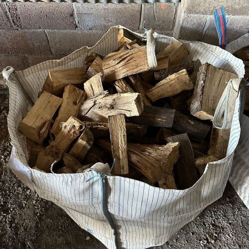 DUMPY BAG OF SPLIT OAK LOGS
