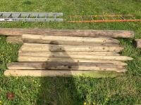 GATE POST & 17 WOODEN FENCE POSTS - 9