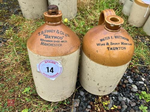 PAIR OF GLAZED STONE JARS (14)