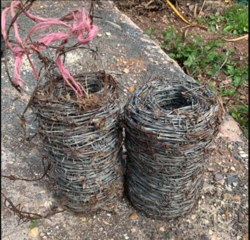 2 ROLLS OF BARBED WIRE