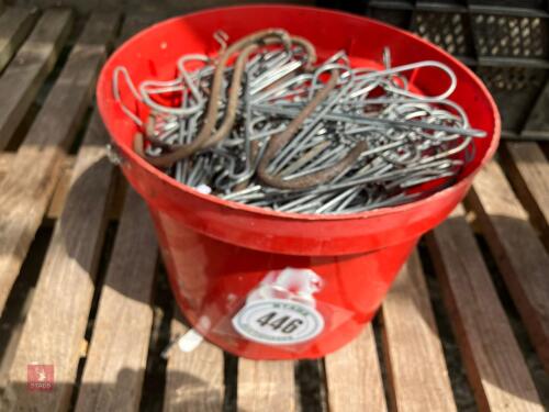 TUB OF METAL PLANT HOOKS