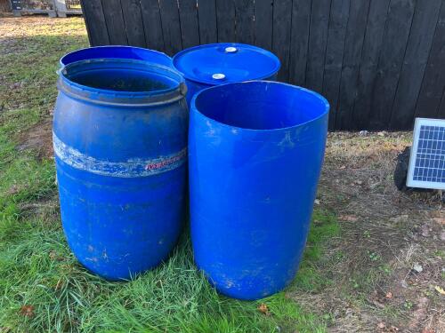 4 BLUE PLASTIC BARRELS