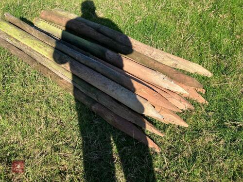 16 WOODEN ROUND FENCE STAKES