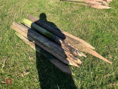 13 WOODEN ROUND FENCE STAKES