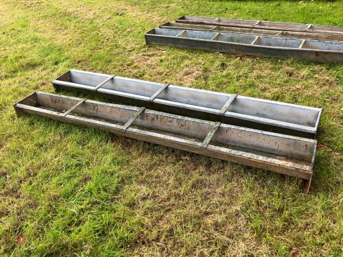 2 X 9' IAE GROUND FEED TROUGHS (1)