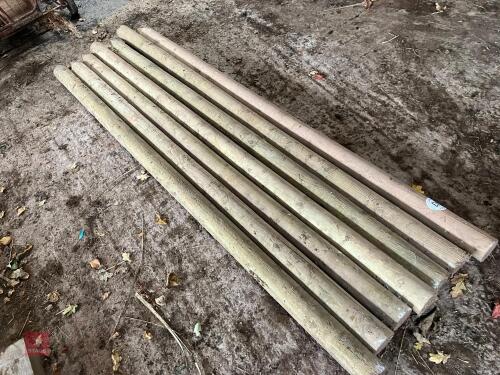 7 8' ROUND WOODEN FENCE POSTS