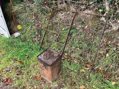 WROUGHT IRON GATE AND VINTAGE FUEL CAN