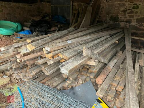 STACK OF WOODEN RAILINGS (151)