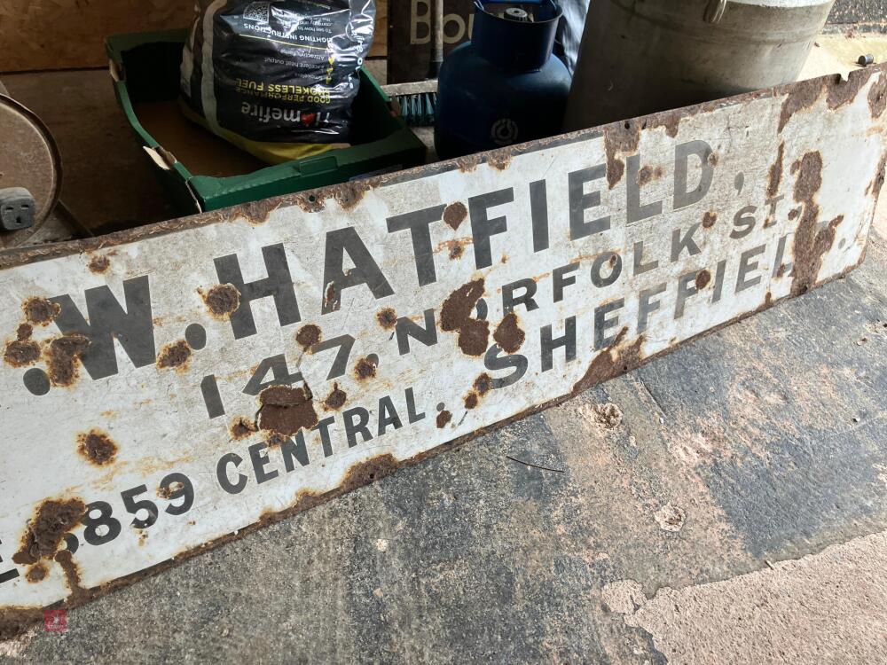 E W HATFIELD SIGN